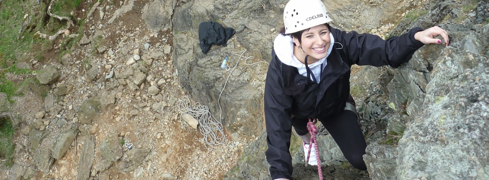 Rock climbing on easy ledge lake district